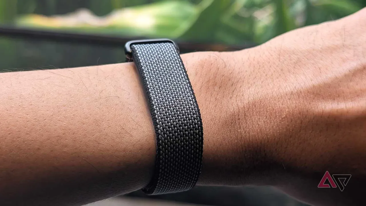Google Fitbit Air smart fitness tracker being worn on a wrist