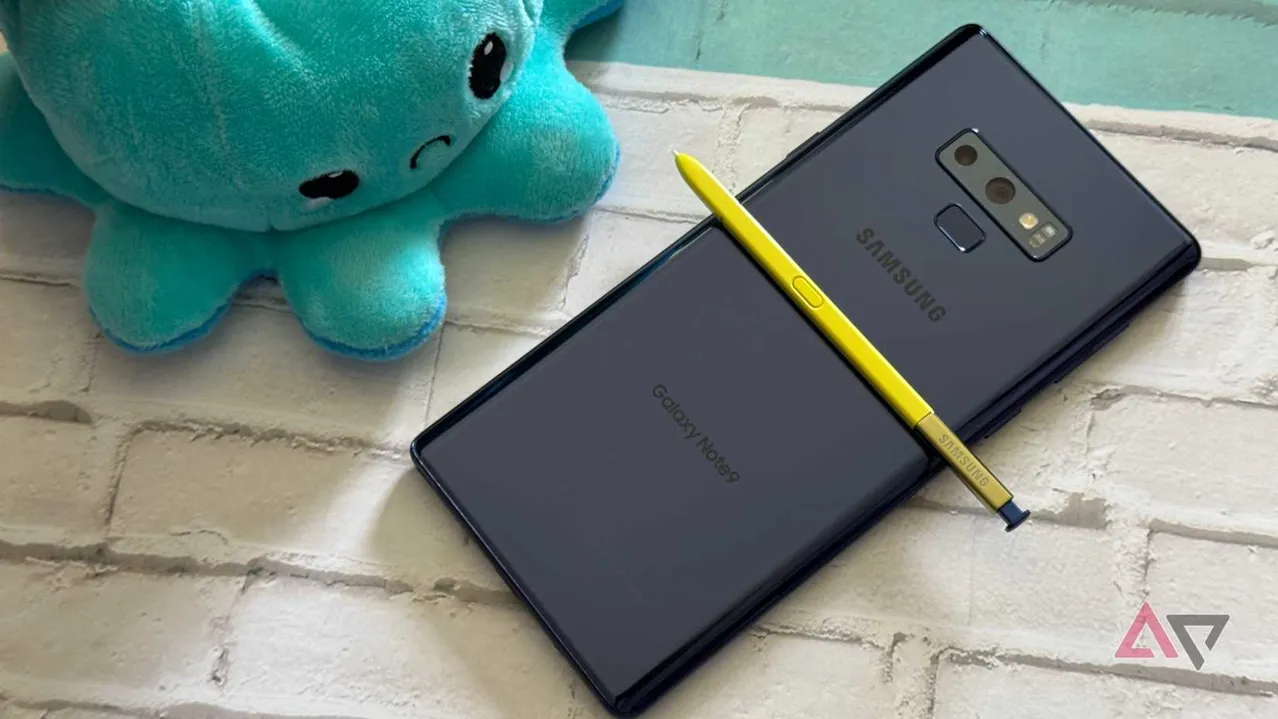 Samsung Galaxy Note 9 sitting next to a plush