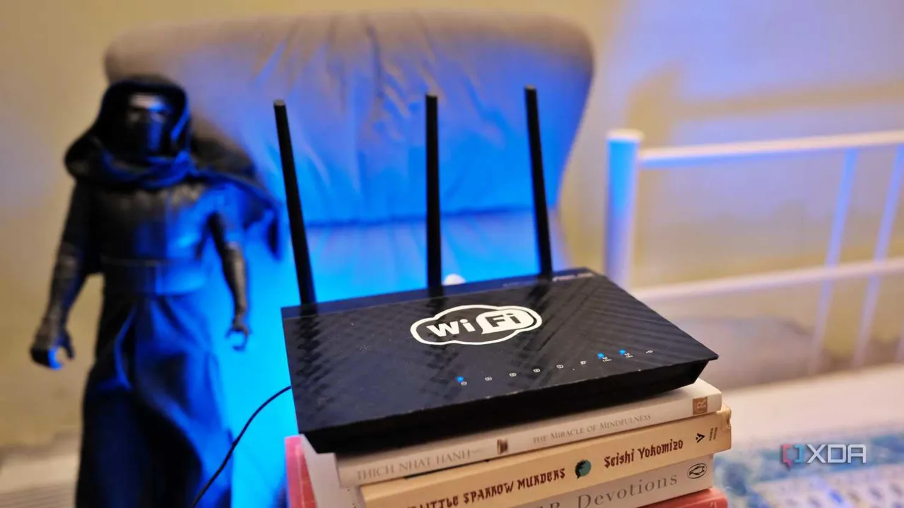 Router on a stack of books with blue light in the background
