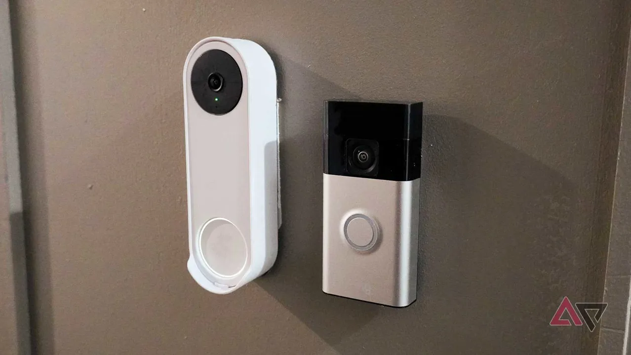 The Ring and Nest battery doorbells mounted to a door.